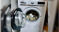 ईडी की रेड में वाशिंग मशीन से निकला करोड़ों का कैश